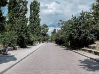 Mauerpark  In the 19th and 20th centuries, the Mauerpark area served as the location of the Old Nordbahnhof ("Northern Railway Station"), the southern terminus of the Prussian Northern Railway opened in 1877-78, which connected Berlin with the city of Stralsund and the Baltic Sea. In 1946, through the division of Berlin into four occupation zones, the land of the Old Nordbahnhof stretching from Bernauer Straße to Kopenhagener Straße was split between the French and Soviet sectors. After the building of the Berlin Wall, the land was included into the heavily guarded Death Strip with walls on either side. One of the viewing platforms, from which West Berlin residents could look over the wall into East Berlin, stood at this location. The remaining western part of the station was turned into a storehouse and commercial area. After the fall of the Berlin Wall in 1989, the former death strip was designated as a public space and one of several green spaces in the city by local residents : 2016, Berliini, Berlin, Fujifilm, Germany, Saksa, digital image, historia, history, kaupunki, kesäloma, matka, summer holiday, town, travel