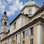 Ljubljana Cathedral (Slovene: Ljubljanska stolnica), also named Saint Nicholas' Church (cerkev svetega Nikolaja, šenklavška cerkev), Saint Nicholas' Cathedral (Slovene: Stolnica svetega Nikolaja), is an easily recognizable landmark of the city with its green dome and twin towers and is located on Cyril and Methodius Square by the nearby Ljubljana Central Market and the Town Hall. Between 1701 and 1706, on the initiative of Dean Janez Anton Dolničar and Academia Operosorum Labacensium, the Jesuit architect Andrea Pozzo designed a new Baroque hall church with two side chapels, resembling a Latin cross. The two belfries, resembling of the Salzburg Cathedral, were added upon the plan by Lombard Giulio Quaglio. Its construction was completed in 1706 and the consecration took place on 8 May 1707.<br />Originally, a fake dome was painted on the arch above the centre until the church's real dome was constructed in 1841. Inside much of the original Baroque decor remains with frescoes painted by Giulio Quaglio between 1703–1706 and later 1721–1723. On the southern wall is a brightly decorated pietà, a copy of one that possibly used to be in the earlier Gothic cathedral.