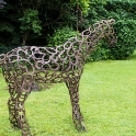 A horse made out of horse shoes