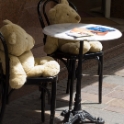 Teddy bears waiting for their food in a street restaurant in Klagenfurt