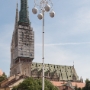 A guy climbed higher to get a picture of the cathedral