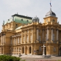 The Croatian National Theatre in Zagreb moved to the new purpose-built building on Marshal Tito Square in Zagreb's Lower Town, where it is based today.<br />Austro-Hungarian emperor Franz Joseph I was at the unveiling of this new building. The building itself was the project of famed Viennese architects Ferdinand Fellner and Herman Helmer, whose firm had built several theatres in Vienna. Celebrations marking the 100th anniversary of the building were held on October 14, 1995.