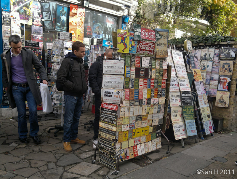 01112011755.jpg - Signs for sale on Portobello road