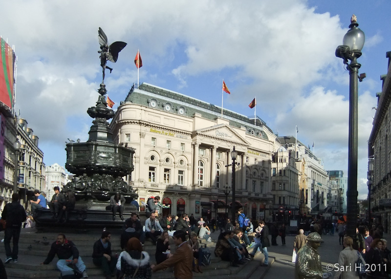 DSCF2840.jpg - Piccadilly Circus and the Shaftesbury Monument Memorial Fountain, erected in 1892-1893 to commemorate the philanthropic works of Lord Shaftesbury, who was a famous Victorian politician and philanthropist.The monument is topped by Alfred Gilbert's winged nude statue of an archer, sometimes referred to as The Angel of Christian Charity and popularly known as Eros after the mythical Greek god of love. Actually the figure is Anteros, the twin brother of Eros. (Wikipedia)