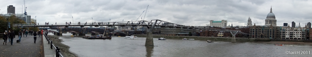 milleniumbridge.jpg - The Millenium Bridge, London Millennium Footbridge, is a steel suspension bridge for pedestrians crossing the River Thames in London, England, linking Bankside with the City. It is located between Southwark Bridge (downstream) and Blackfriars Railway Bridge (upstream). The bridge is owned and maintained by the Bridge House Estates, a charitable trust overseen by the City of London Corporation. Construction of the bridge began in 1998, with the opening on 10 June 2000. It was closed for two years immediately after it was opened because of wobbling. It was reopened in 2002.