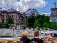 20160628 Berlin XT1 1754  On the left is The Reichstag President's Palace, which was designed by Paul Wallot and erected 1899-1904 on the only undeveloped land in its immediate vicinity. On the right is Reichstag building. In 1882, another architectural contest was held, with 200 architects participating. This time the winner, the Frankfurt architect Paul Wallot, would actually see his Neo-Baroque project executed. The Reichstag's decorative sculptures, reliefs, and inscriptions were by sculptor Otto Lessing. On 29 June 1884, the foundation stone was finally laid by Wilhelm I, at the east side of the Königsplatz. Before construction was completed by Philipp Holzmann A.G. in 1894. In 1992, Norman Foster won yet another architectural contest for the reconstruction of the building. His winning concept looked very different from what was later executed. Notably, the original design did not include a cupola. : 2016, Berliini, Berlin, Fujifilm, Germany, Saksa, digital image, historia, history, kaupunki, kesäloma, matka, summer holiday, town, travel