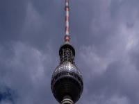 Fernsehturm  The Fernsehturm (English: Berlin TV Tower) is a television tower in central Berlin, Germany. Close to Alexanderplatz in Berlin-Mitte, the tower was constructed between 1965 and 1969 by the administration of the German Democratic Republic (GDR). It was intended as a symbol of Berlin, which it remains today, as it is easily visible throughout the central and some suburban districts of Berlin. With its height of 368 meters, it is the tallest structure in Germany, and the second tallest structure in the European Union. The TV tower had several architects. Its former design was done by Hermann Henselmann, and Jörg Streitparth. It was built by the East German architects Fritz Dieter, Günter Franke and Werner Ahrendt between 1965-69. Walter Herzog, Gerhard Kosel and Herbert Aust later also took part in the planning. : 2016, Berliini, Berlin, Fujifilm, Germany, Saksa, digital image, historia, history, kaupunki, kesäloma, matka, summer holiday, town, travel