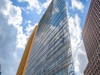 Potsdamer Platz  On the left, standing 70 metres high and boasting 18 floors, Forum Tower is one of the three tallest buildings at Potsdamer Platz. Italian architect Renzo Piano created a prominent landmark for the new city centre with this edifice. On the right partially visible is Kollhoff Tower by architect Hans Kollhoff, home to a number of prestigious law firms. Potsdamer Platz No. 1 also houses the "Panoramapunkt" viewing platform, located 100 m above ground level, which is accessed by riding Europe's fastest elevator (8.65 metres per second). : 2016, Berliini, Berlin, Fujifilm, digital image, kaupunki, kesäloma, summer holiday, town