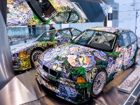 BMW Art Car  BMW Art Car, 1992. The BMW Art Car Project was introduced by the French racecar driver and auctioneer Hervé Poulain, who wanted to invite an artist to create a canvas on an automobile. This 1992 version is BMW M3 GTR and the artist was Sandro Chia. He is an Italian painter and sculptor : 2016, BMW, BMW Museum, BMW Welt, Fujifilm, LG G3, Munich, München, car, digital image, historia, history, kesäloma, matka, motorbike, phone image, summer holiday, travel