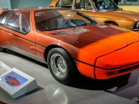 BMW Turbo  BMW Turbo, 1972. The E25 Turbo concept sports car was built by BMW as a celebration for the 1972 Summer Olympics in Munich. It was designed by Paul Bracq, with gullwing doors and was based on a modified 2002 chassis with a mid-mounted engine. The Turbo featured a 200 hp turbocharged version of the engine from the BMW 2002, foam-filled front and rear sections to absorb impact, side impact beams, a braking distance monitor utilizing radar, and a futuristic cockpit. The car developed 206 kW (276 hp) at 7100 rpm and reached 100 km/h from a standstill in 6.6 seconds. The top speed was 250 km/h. Only two were ever built. : 2016, BMW, BMW Museum, BMW Welt, Fujifilm, LG G3, Munich, München, car, digital image, historia, history, kesäloma, matka, motorbike, phone image, summer holiday, travel