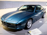 BMW 840 Ci  BMW 840 Ci, 1989. The BMW 8 Series (chassis code: E31) is a Grand Tourer built by BMW from 1989 to 1999 powered by either a V8 or V12 engine. While it did supplant the original E24 based 6 Series in 1991, a common misconception is that the 8 Series was developed as a successor. It was actually an entirely new class aimed at a different market, however, with a substantially higher price and better performance than the 6 series. The 840Ci exists with two different engine packages. The first used the 4 litre M60B40 engine with 286 PS (210 kW) and was produced from mid-1993 to late 1995. From mid-1995, production phased in the newer 4.4 litre M62B44 engine, which had better fuel economy and more torque, though power output remained unchanged. The 840Ci was available with a 5-speed automatic transmission, though European cars were given the option of a 6-speed manual transmission. The only external features distinguishing the V8 model from the V12 models were the quad round exhausts, which were square in the V12 models. The 840Ci stayed in production until May 1999. : 2016, BMW, BMW Museum, BMW Welt, Fujifilm, LG G3, Munich, München, car, digital image, historia, history, kesäloma, matka, motorbike, phone image, summer holiday, travel