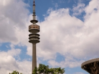 Olympic Tower  The Olympiaturm has an overall height of 291 m and a weight of 52,500 tonnes. At a height of 190 m there is an observation platform as well as a small rock and roll museum housing various memorabilia. Since its opening in 1968 the tower has registered over 35 million visitors (as of 2004). At a height of 182 m there is a revolving restaurant that seats 230 people. A full revolution takes 53 minutes. The tower has one Deutsche Telekom maintenance elevator with a speed of 4 m/s, as well as two visitor lifts with a speed of 7 m/s which have a capacity of about 30 people per car. The travel time is about 30 seconds. : 2016, BMW, BMW Museum, BMW Welt, Fujifilm, LG G3, Munich, München, car, digital image, historia, history, kesäloma, matka, motorbike, phone image, summer holiday, travel